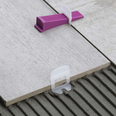 Kit pince + 150 cales + 150 croisillons 2 mm auto-nivelants de 3 à 12 mm